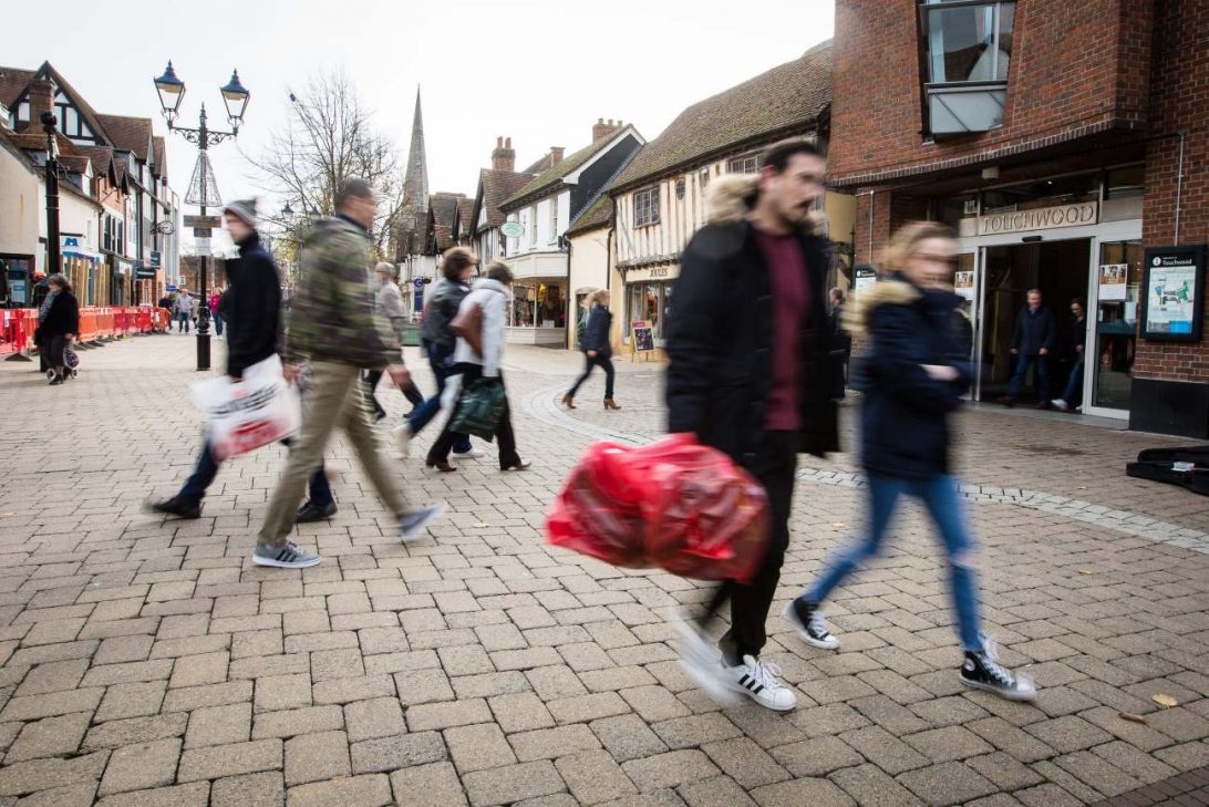 People shopping on a high street in the Midlands