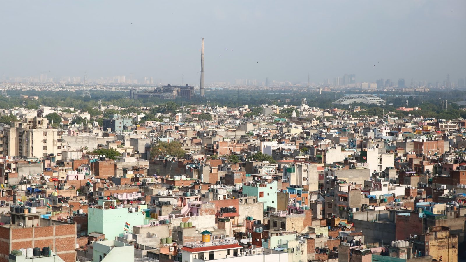 White and brown concrete buildings shot from a distance