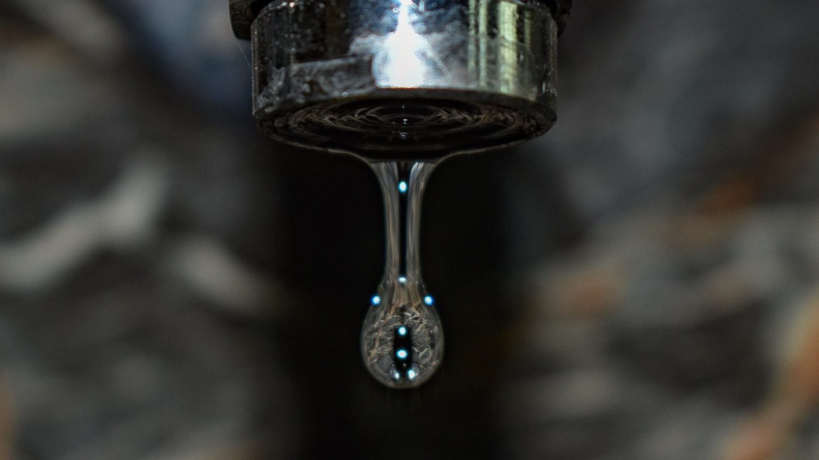 Water dripping from a faucet