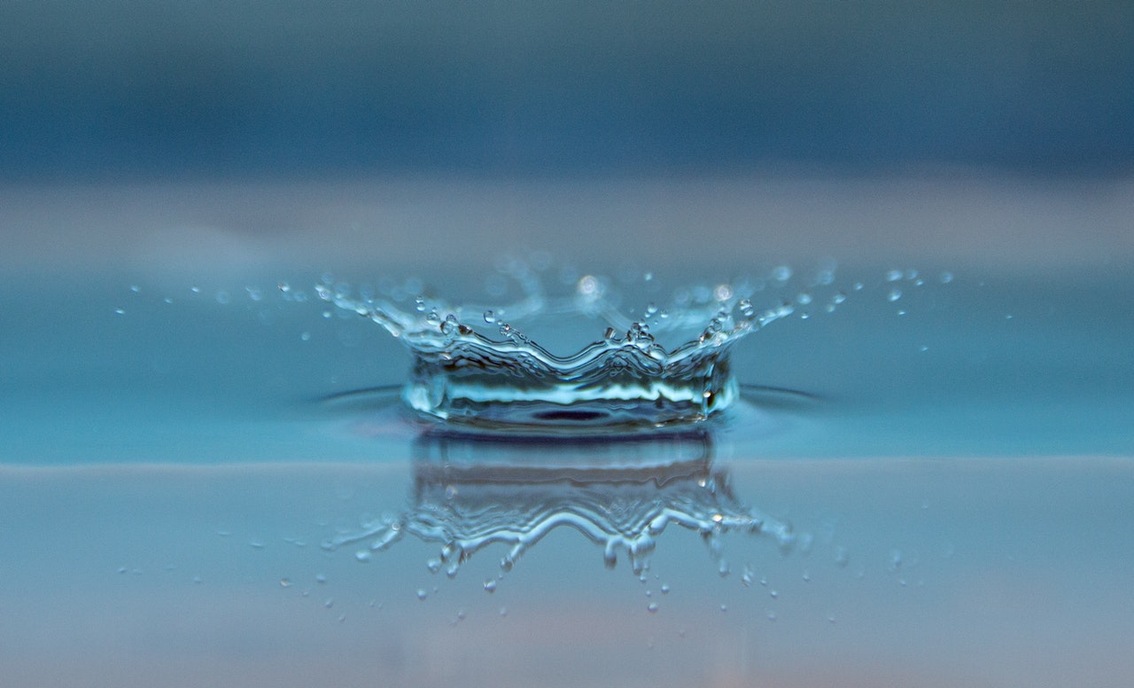 Water droplet in shallow water