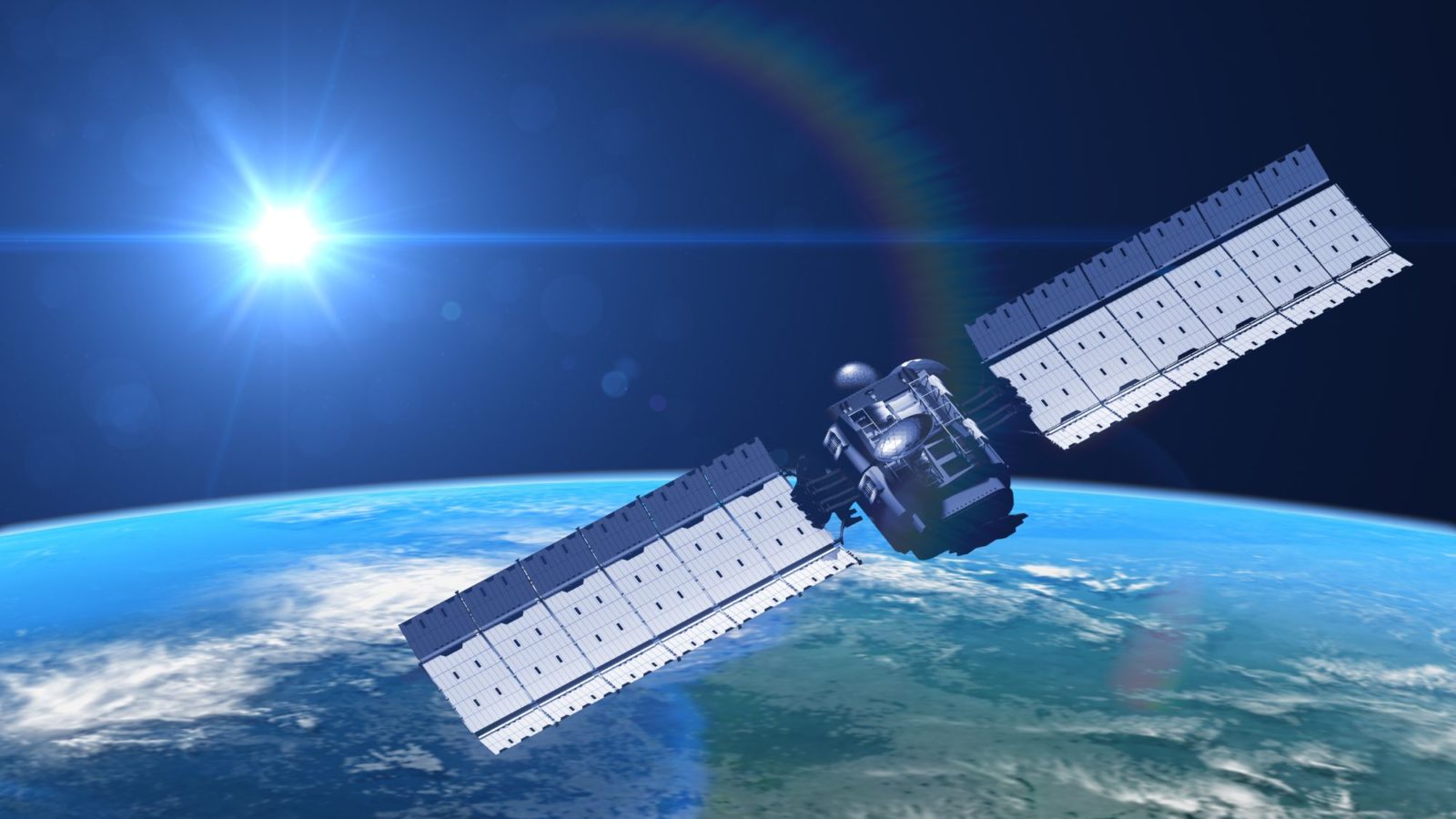 Illustration: Satellite over earth, sunshines in the background creating a rainbow liens flair