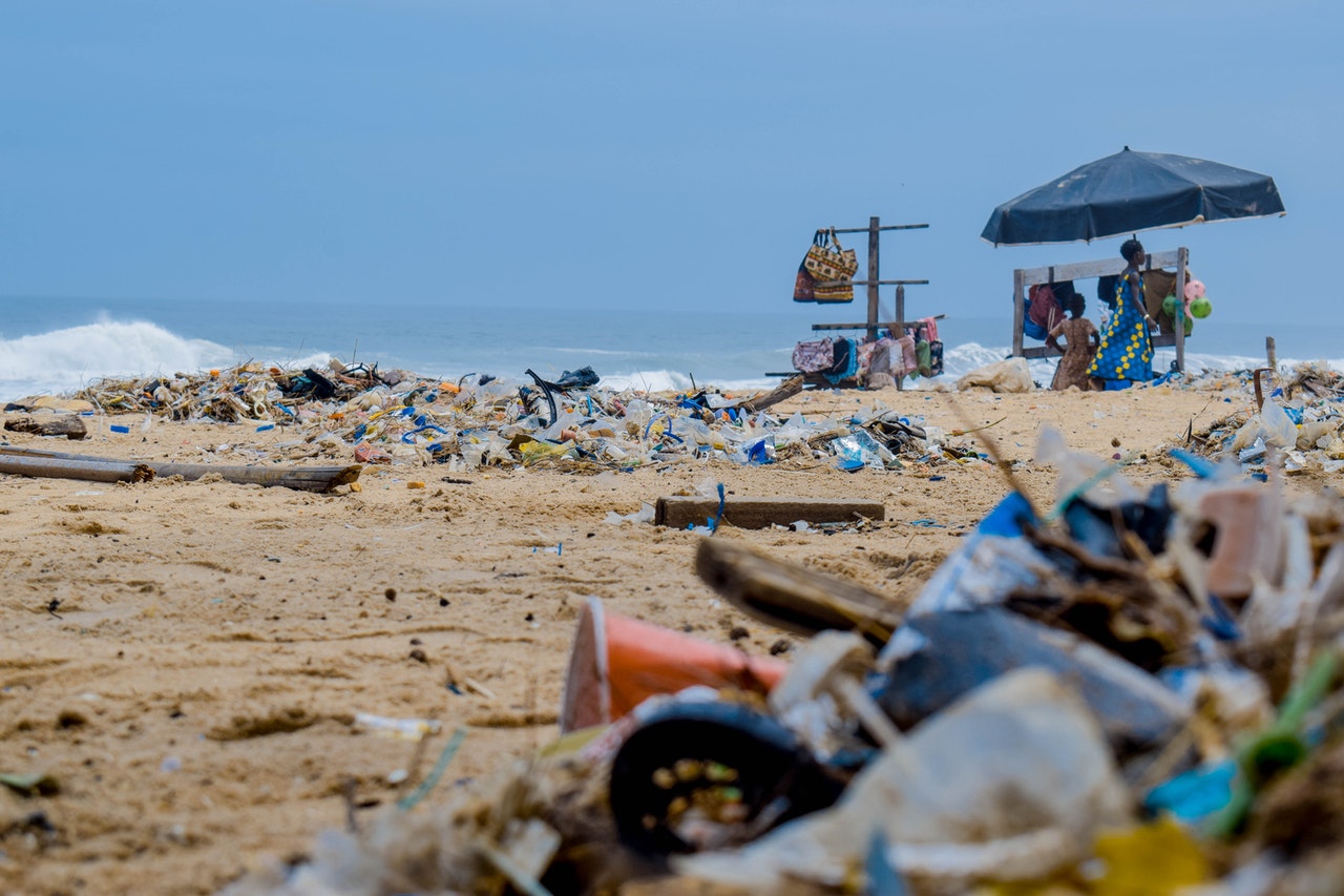 Piles of plastic waste on a beach
