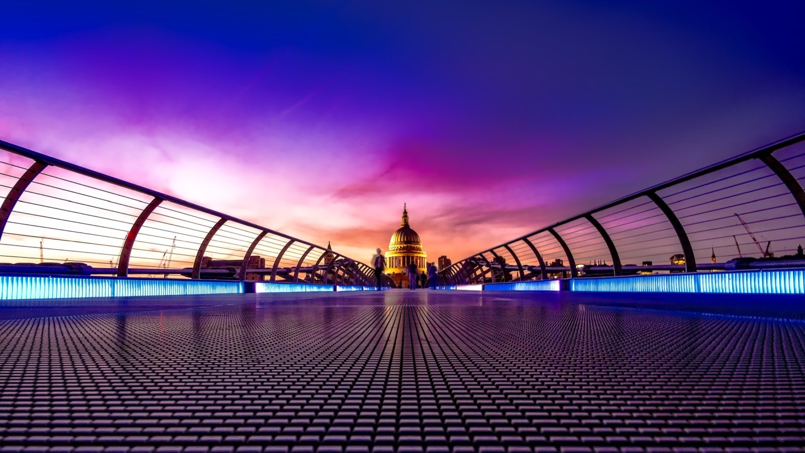 The view across to St Paul's from Millennium Bridge at sunset