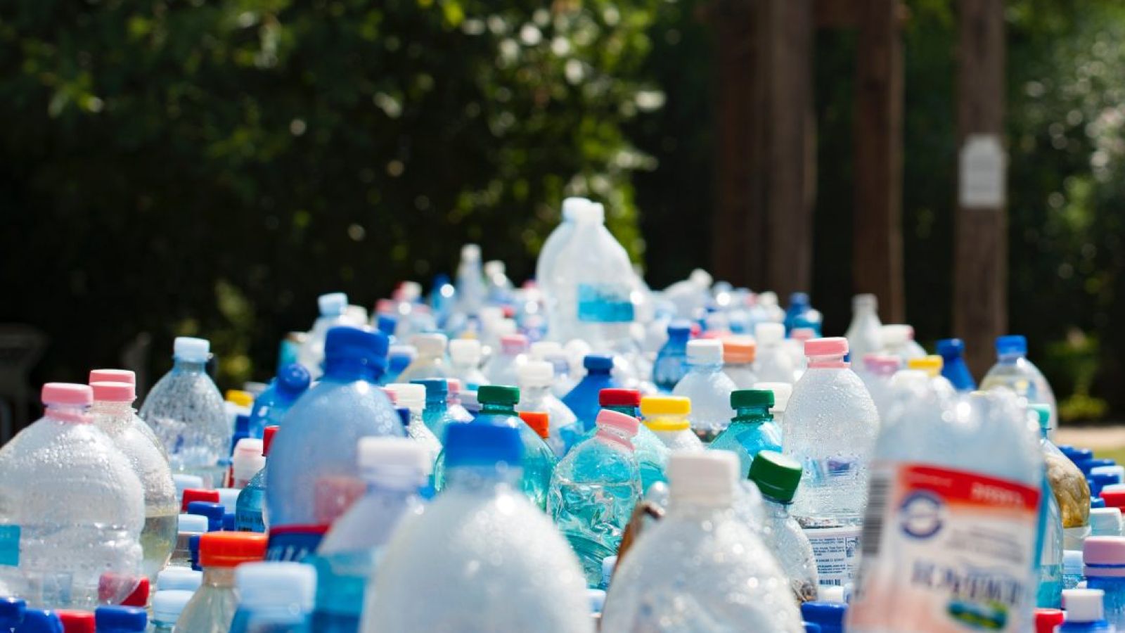 Empty plastic bottles on a table outside