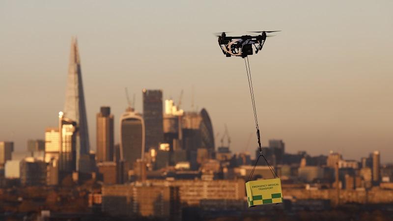 A drone carrying medical supplies across the city