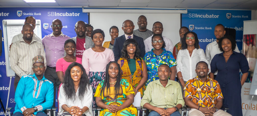Ghana explorer event guests sit for a group photograph|Mrs Catherine Appiah-Pinkrah