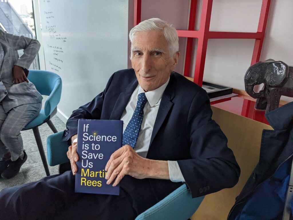 Martin Rees holds his book "If Science is to Save us"