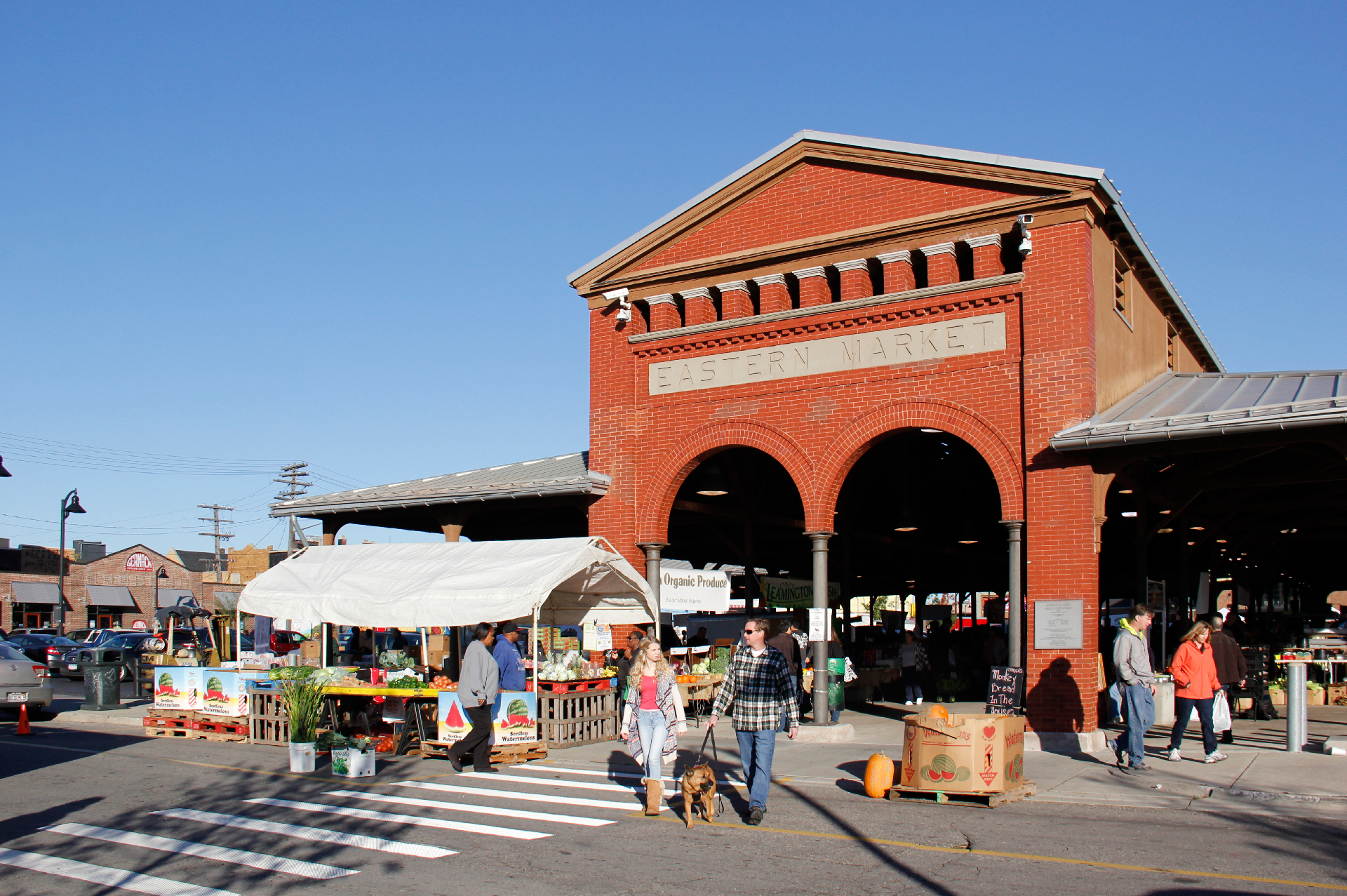 Eastern Market in Detroit|Toyoto Van|The entrance of Eastern District Market in the evening.|Fruit stall in Detriot outside Eastern Farmers Market|The entrance of Eastern District Market in the evening.|Image of a market selling fresh fruit in Detroit.|Image of a market selling fresh fruit in Detroit.