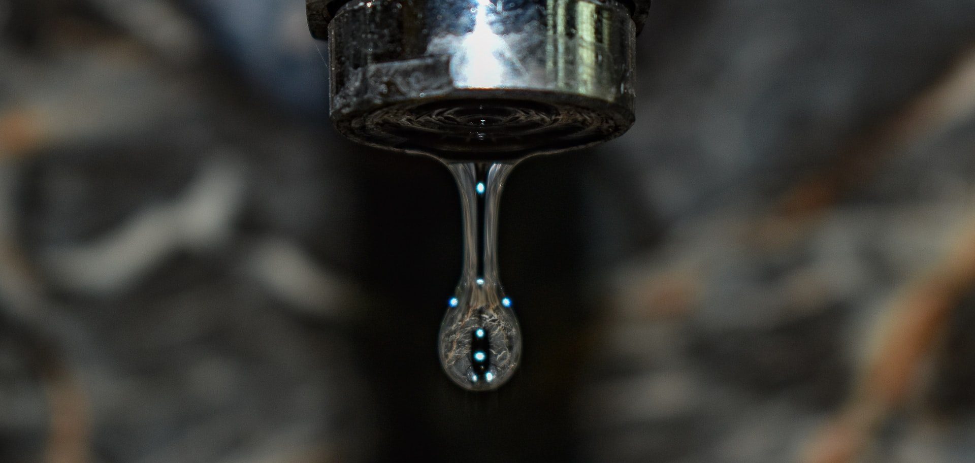 Water dripping from a faucet