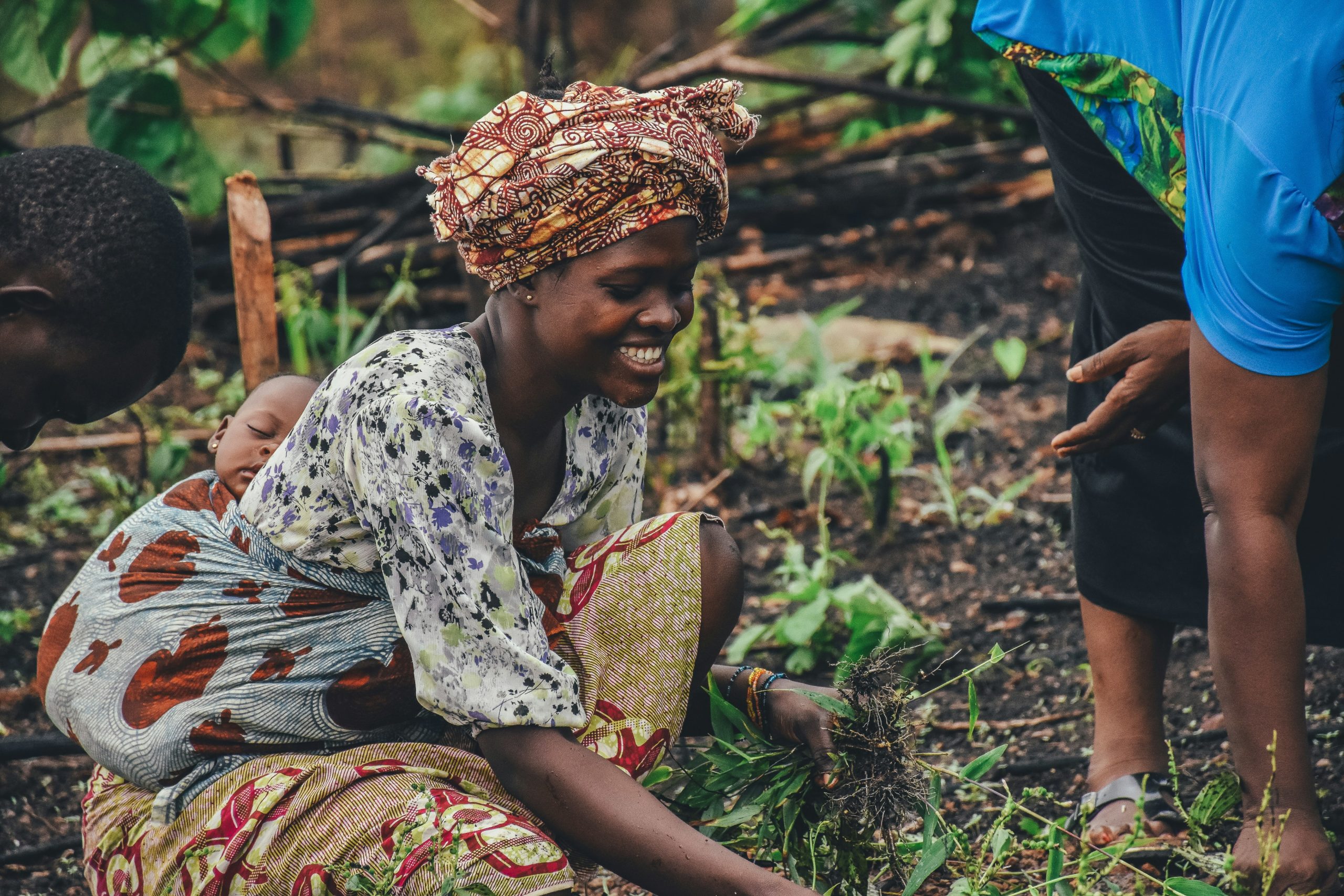 Woman in Sierra Leone holding grass