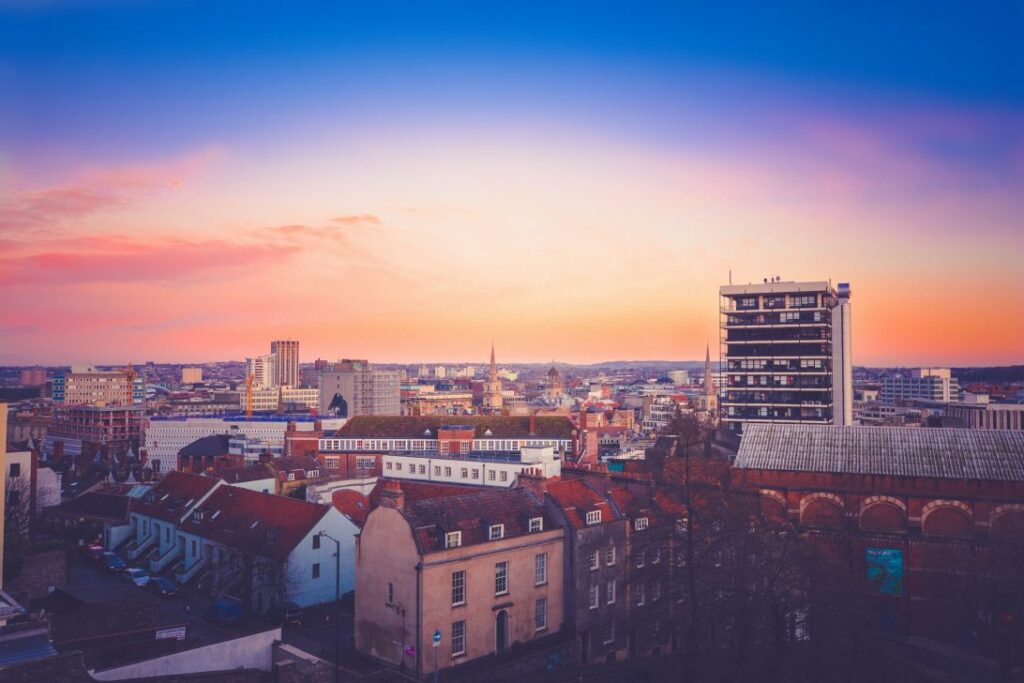 Aerial photograph of a city at sunset