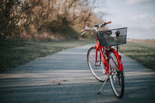 A red bike with a basket