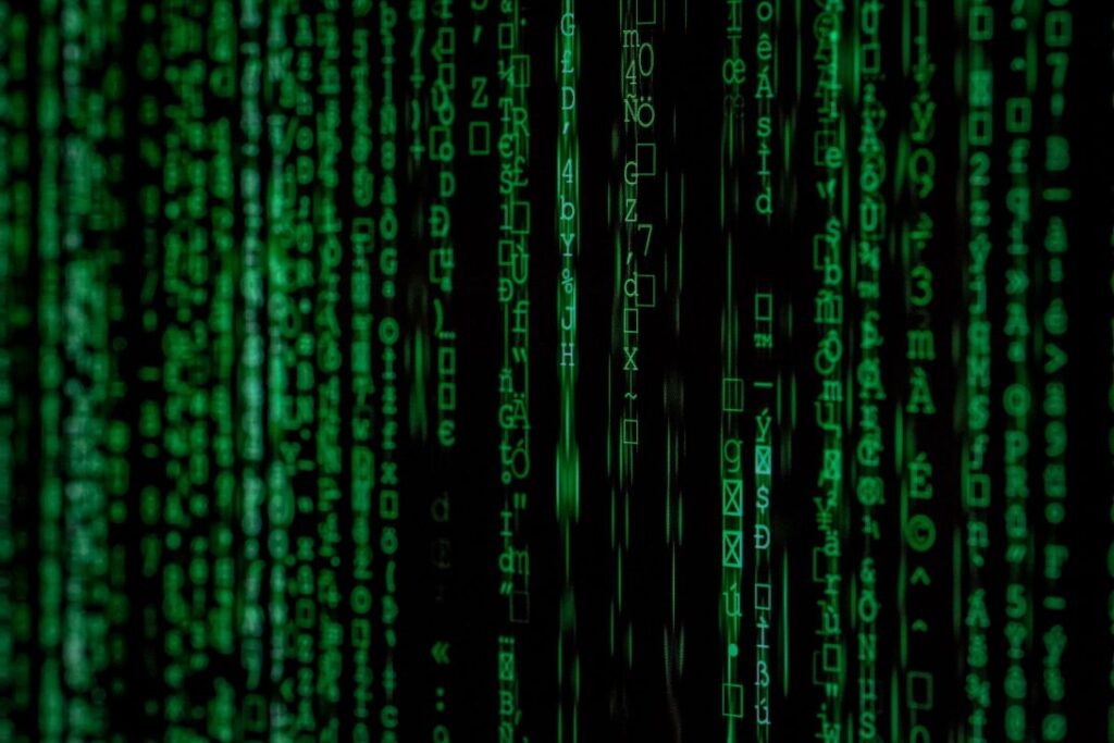 Visual representation of the internet; green binary code scrolling down a black screen|IBM logo|Two teenagers