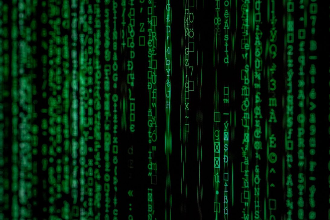 Visual representation of the internet; green binary code scrolling down a black screen|IBM logo|Two teenagers