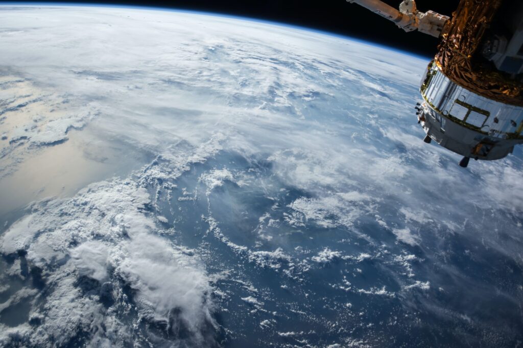 view of a satellite orbiting the Earth from space