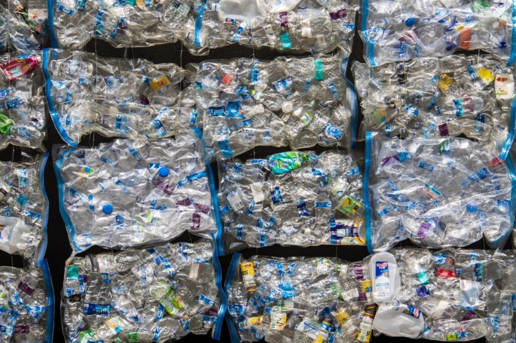Bales of plastic waste await recycling