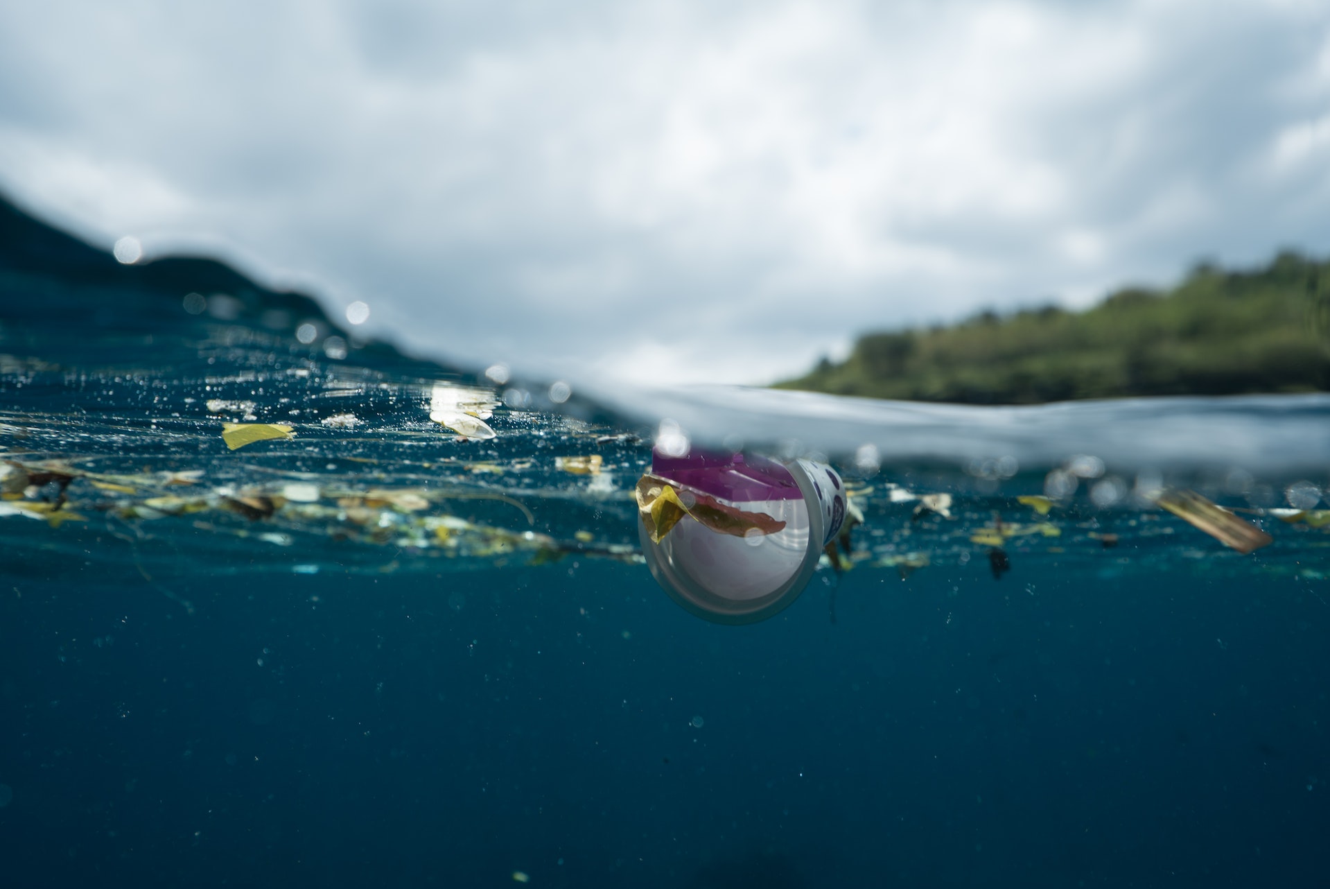 plastic debris and rubbish floating on the surface of the ocean