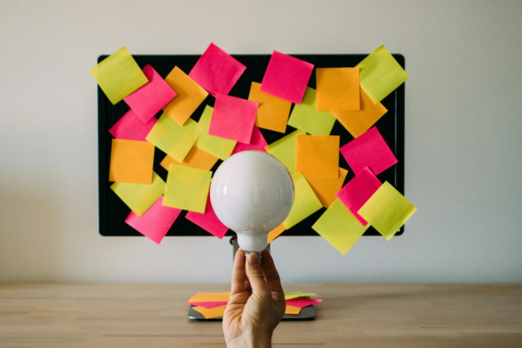 Lightbulb innovation and sticky notes