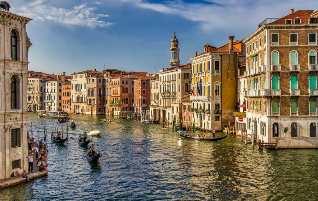 Venice water way|Tram in a city|Cycling Italian city