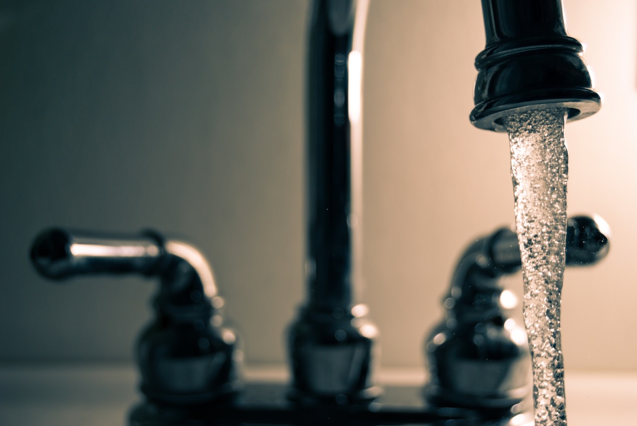 Water running out of a stainless steel tap|A Fenix Hub sensor platform and two turbines|Horizon 2020 logo - European Funding for Research and Innovation